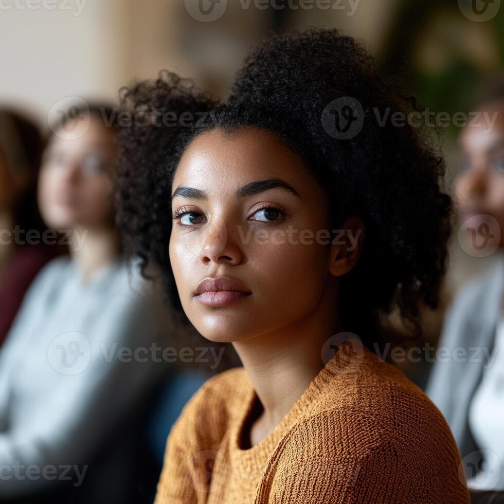 Engaged participants in group therapy session photo