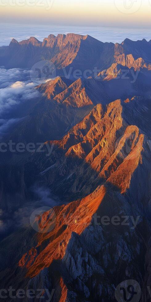 A view of mountains from an airplane photo