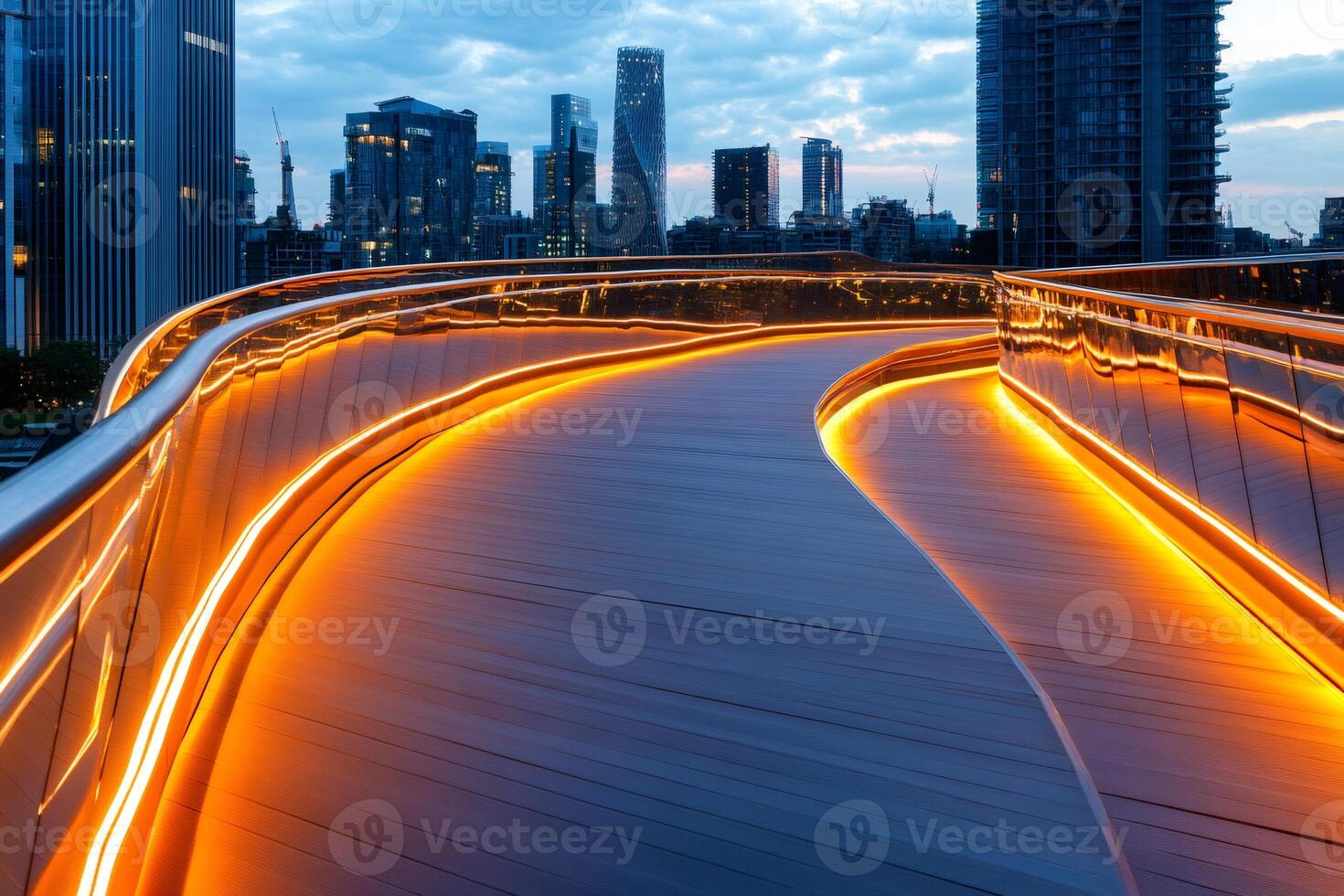 Illuminated pedestrian bridge with orange led lights in Nine Elms, London at sunset photo