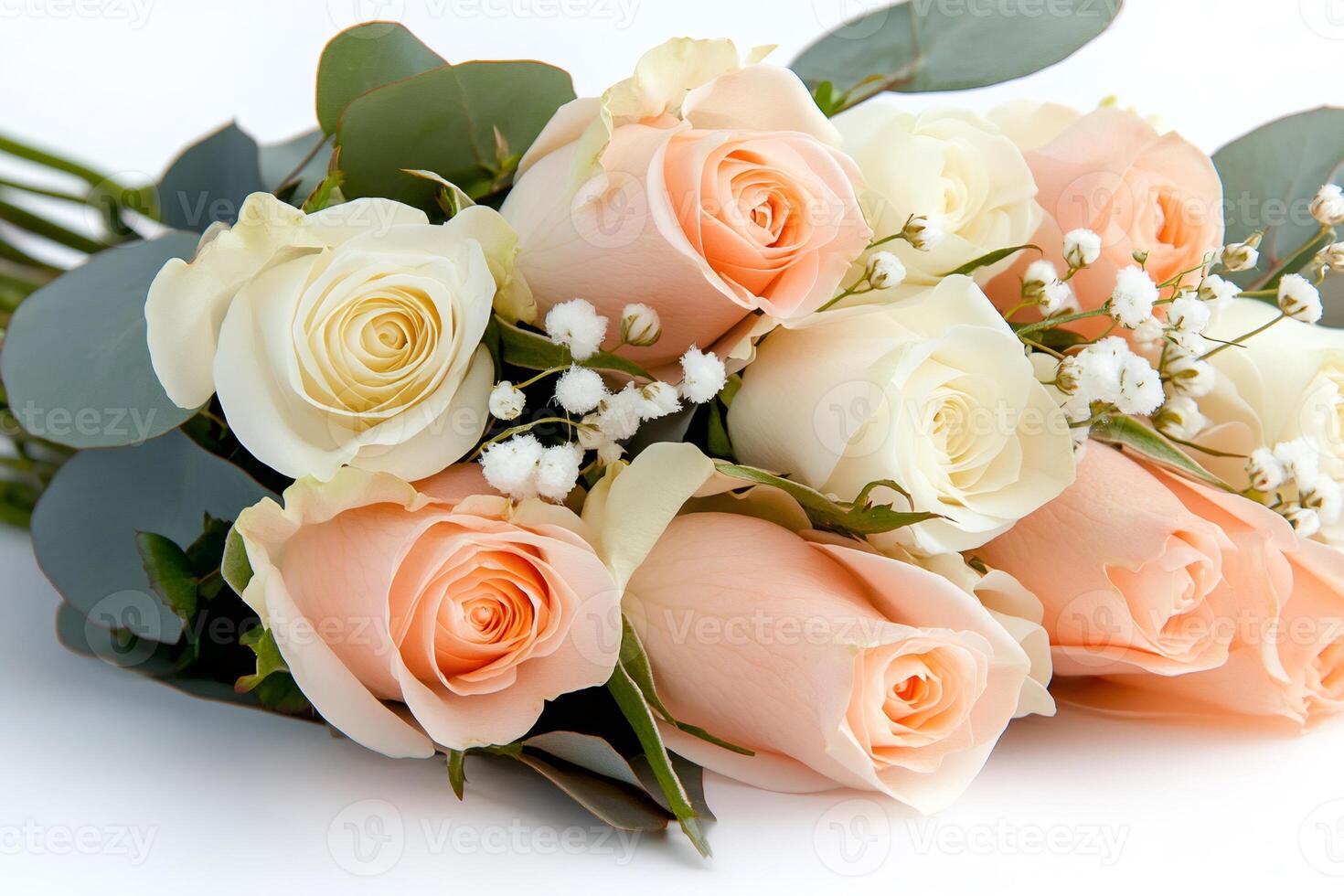 Delicate bouquet of peach and white roses lying on a white surface photo