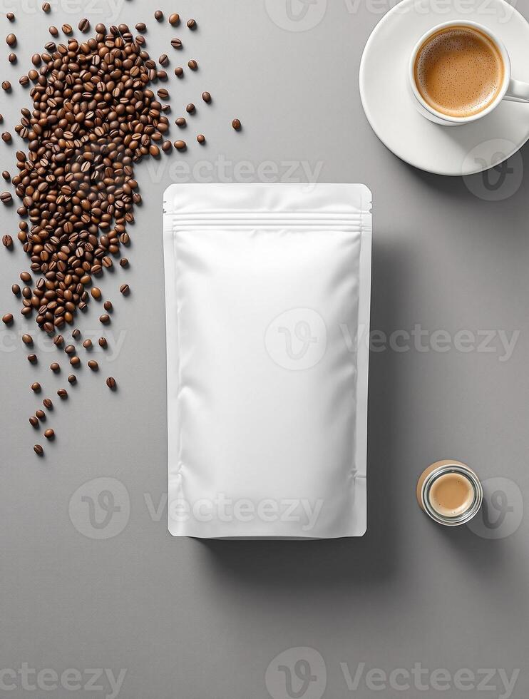 Coffee beans and a white bag with a cup of coffee on a gray background photo
