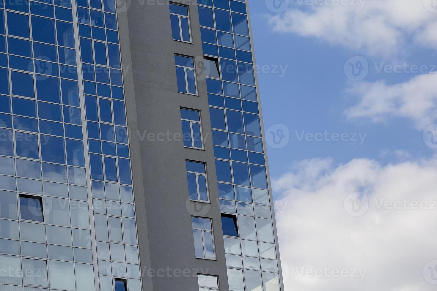 Modern office building against the backdrop of the sky photo