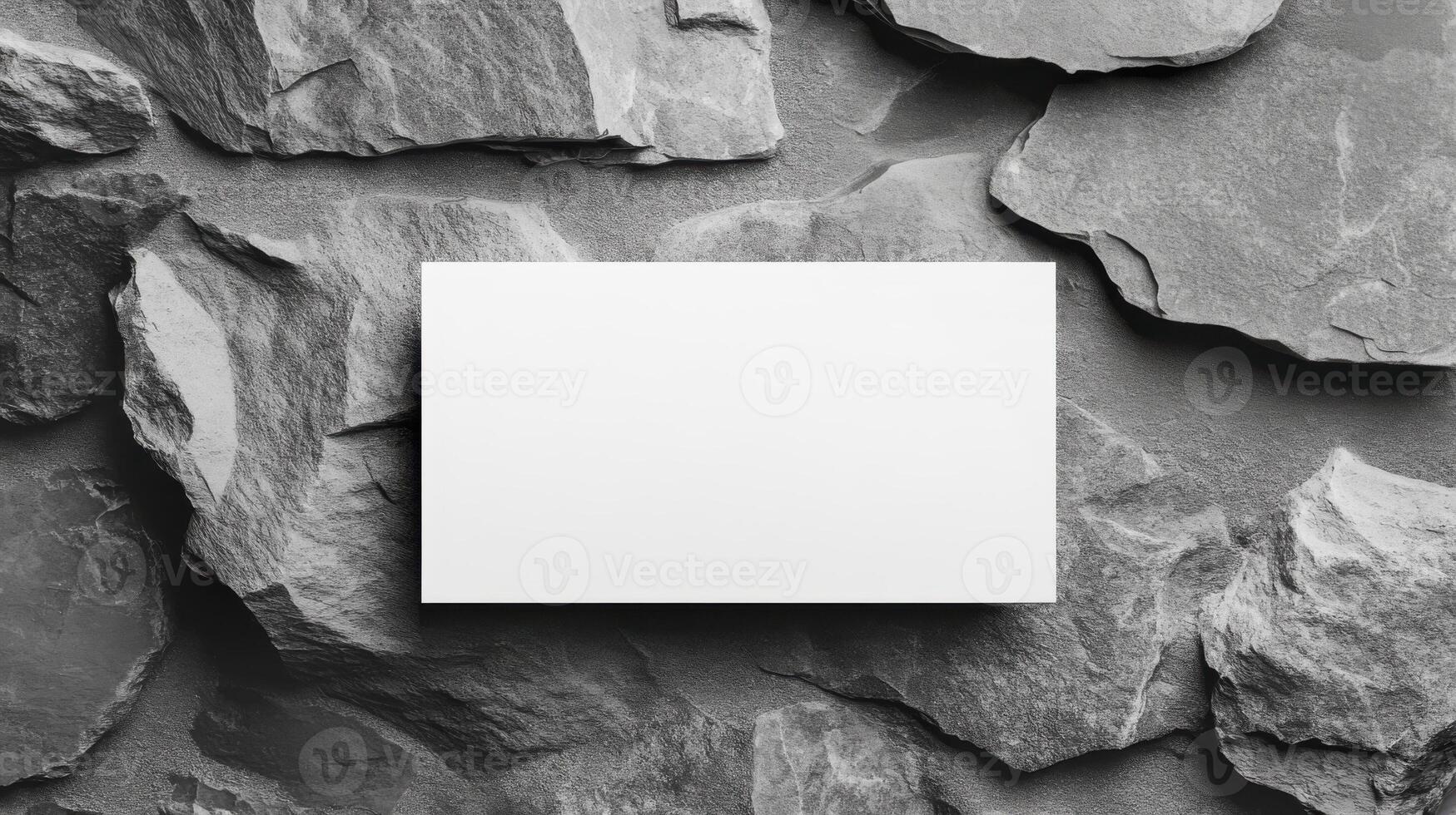 Top view template for business card. Mockup white card on grey slate texture background. photo