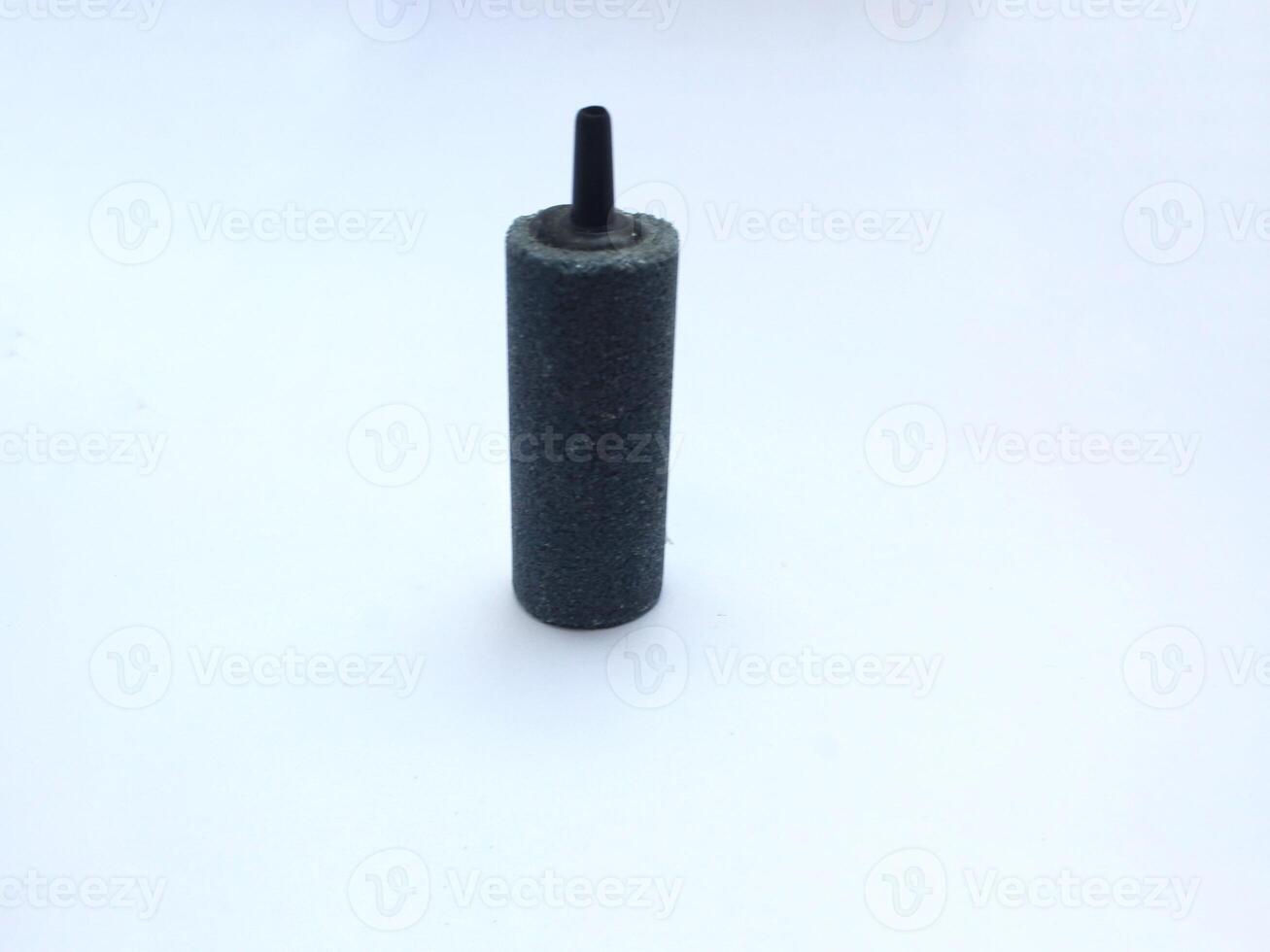 Cylinder shaped air stones for aquariums are used to circulate oxygen photo