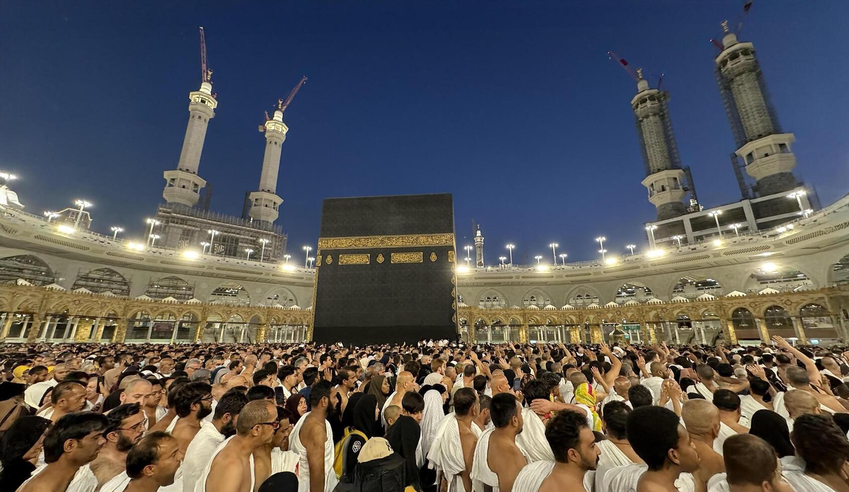MECCA, SAUDI ARABIA - MAY 02 2024. View on Kaaba from second floor of Masjid Al Haram through some new constructions building around the masjid. High quality photo