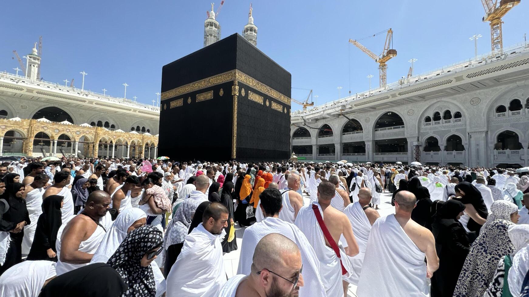 MECCA, SAUDI ARABIA - MAY 02 2024. View on Kaaba from second floor of Masjid Al Haram through some new constructions building around the masjid. High quality photo