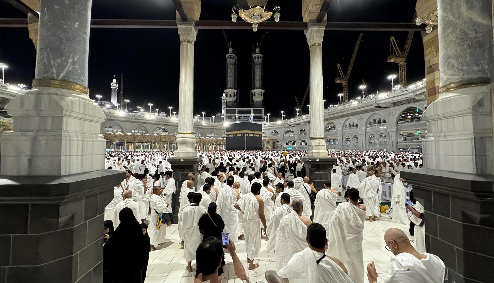 MECCA, SAUDI ARABIA - MAY 02 2024. View on Kaaba from second floor of Masjid Al Haram through some new constructions building around the masjid. High quality photo