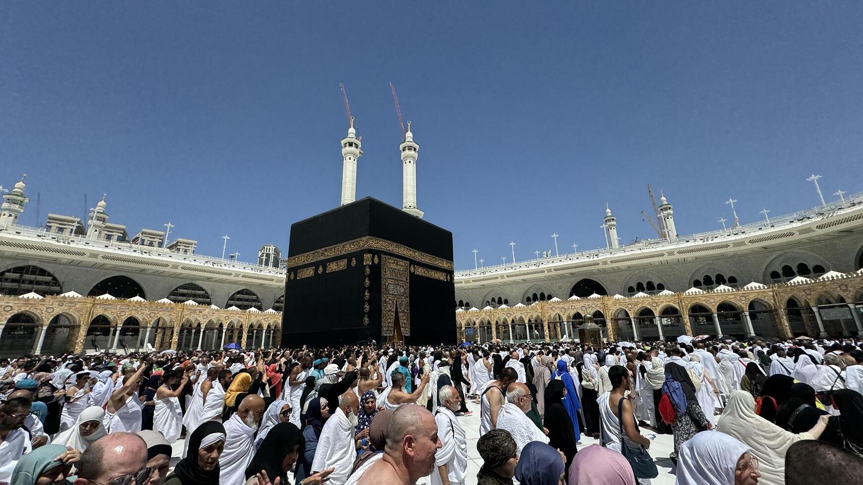 MECCA, SAUDI ARABIA - MAY 02 2024. View on Kaaba from second floor of Masjid Al Haram through some new constructions building around the masjid. High quality photo