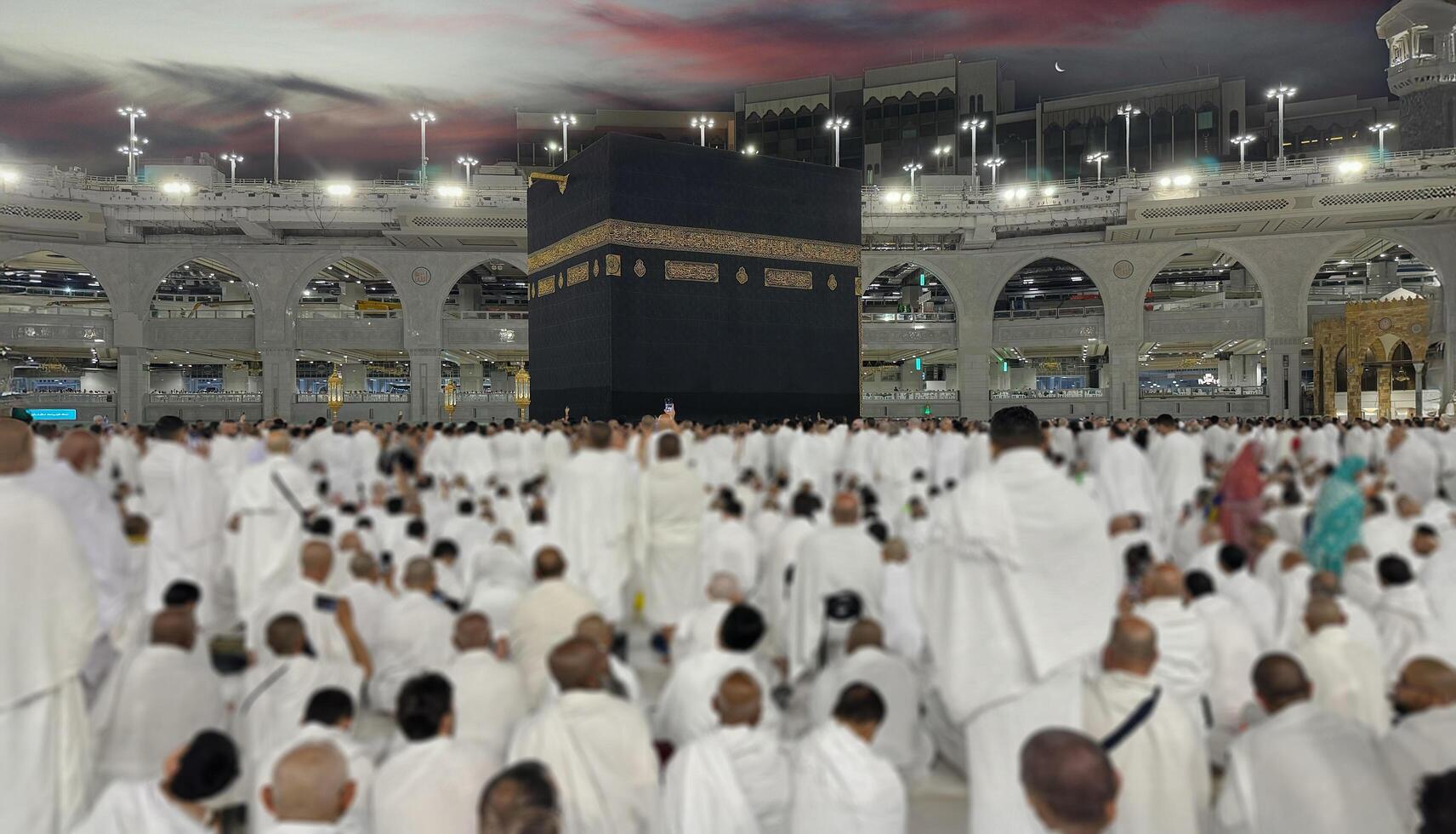Muslim pilgrims perform Tawaf around the Kaaba after dawn prayer at Masjid al-Haram in Makkah. Translation. Praise be to Allah Who created the heavens and the earth and made the darkness and the light photo
