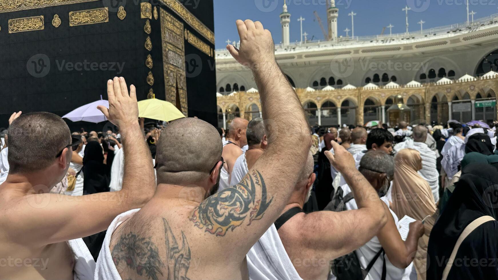 Muslim pilgrims perform Tawaf around the Kaaba after dawn prayer at Masjid al-Haram in Makkah, Saudi Arabia. Muslims worldwide face the Kaaba in prayer, symbolizing unity and devotion in Islam photo