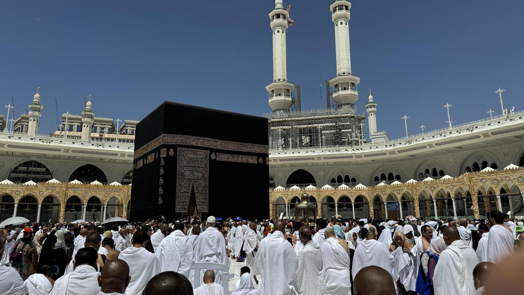 Muslim pilgrims perform Tawaf around the Kaaba after dawn prayer at Masjid al-Haram in Makkah. Translation. Praise be to Allah Who created the heavens and the earth and made the darkness and the light photo