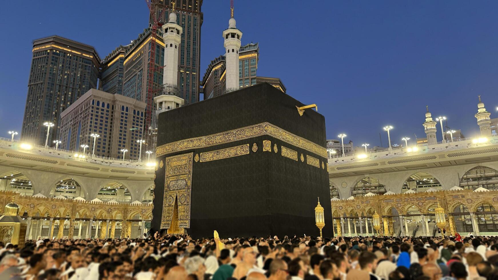 Muslim pilgrims perform Tawaf around the Kaaba after dawn prayer at Masjid al-Haram in Makkah. Translation. Praise be to Allah Who created the heavens and the earth and made the darkness and the light photo