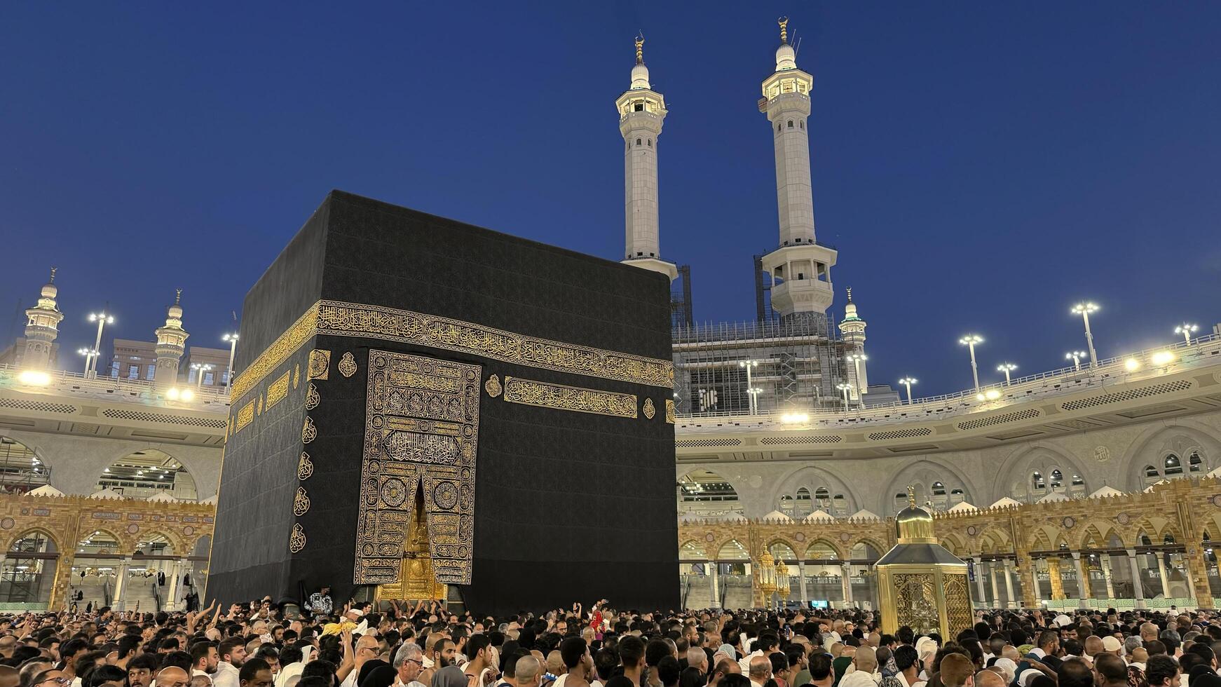 Muslim pilgrims perform Tawaf around the Kaaba after dawn prayer at Masjid al-Haram in Makkah. Translation. Praise be to Allah Who created the heavens and the earth and made the darkness and the light photo