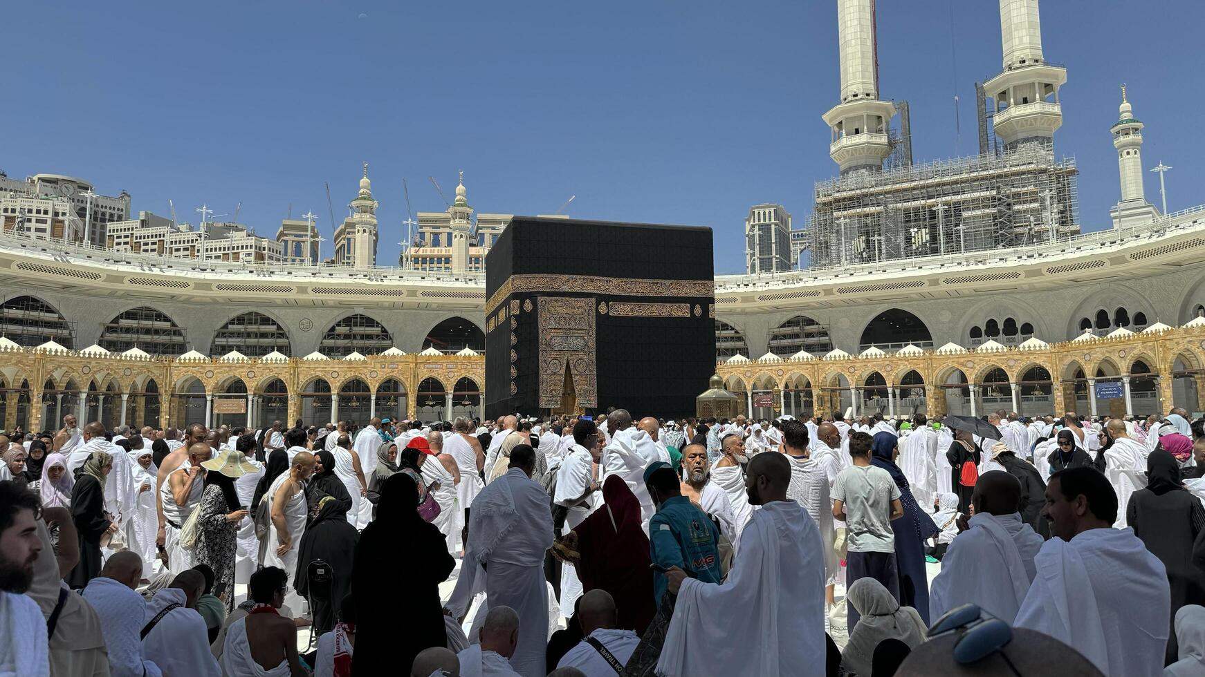 Muslim pilgrims perform Tawaf around the Kaaba after dawn prayer at Masjid al-Haram in Makkah. Translation. Praise be to Allah Who created the heavens and the earth and made the darkness and the light photo