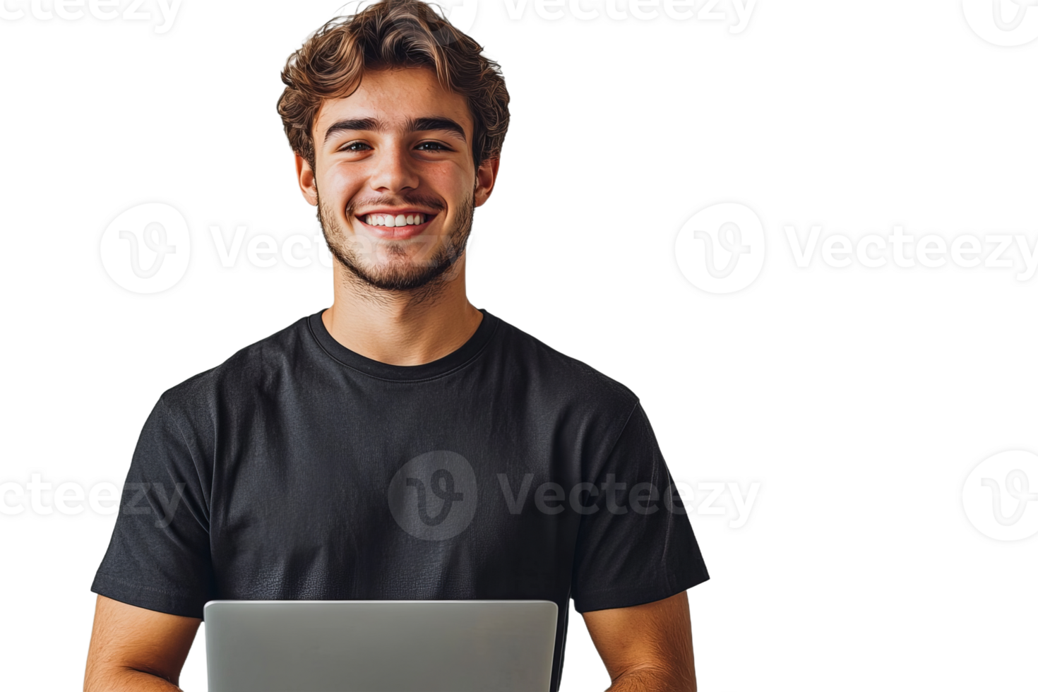 Young man smiling while using a laptop indoors png
