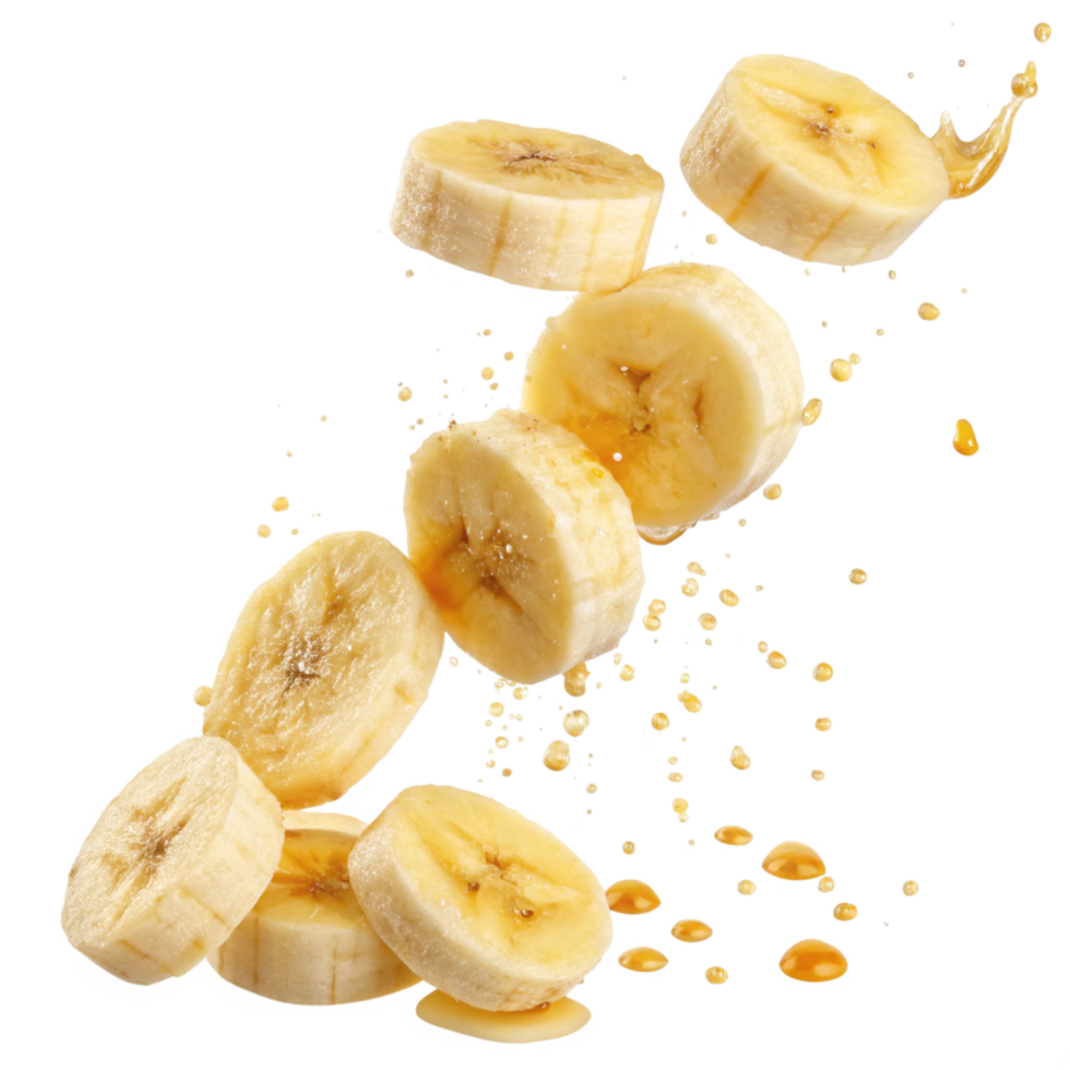 Delicious Banana Slices Falling with Honey Drizzle Splashing Fresh Fruit png