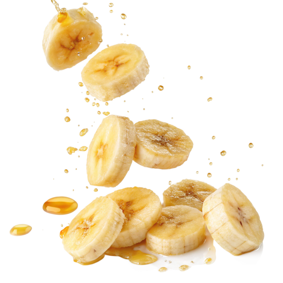 Delicious Banana Slices Drizzled with Honey in Mid Air Splash png