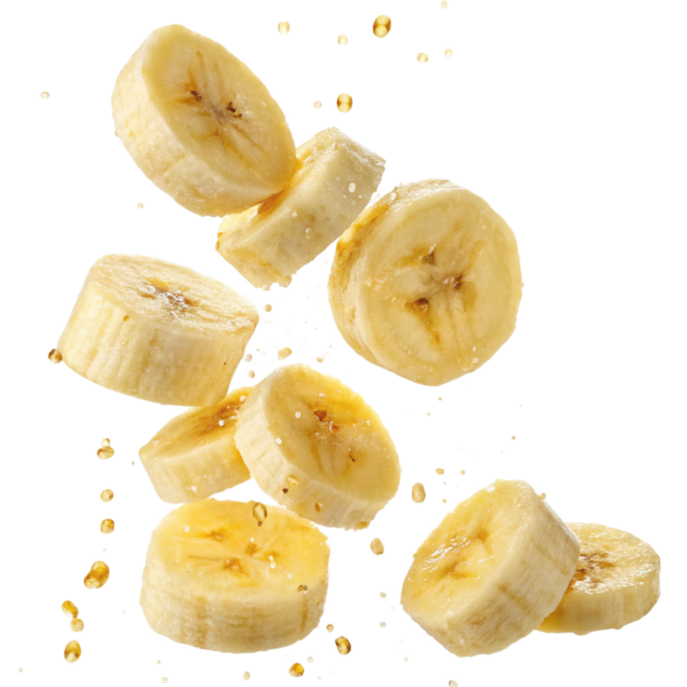 Flying Banana Slices with Juice Droplets Splashing on Black Background png