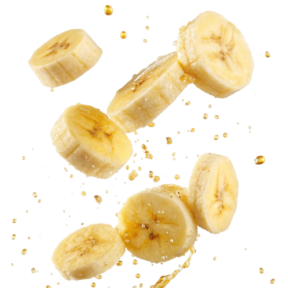 Flying Banana Slices Splashing in Juice Delicious Tropical Fruit png