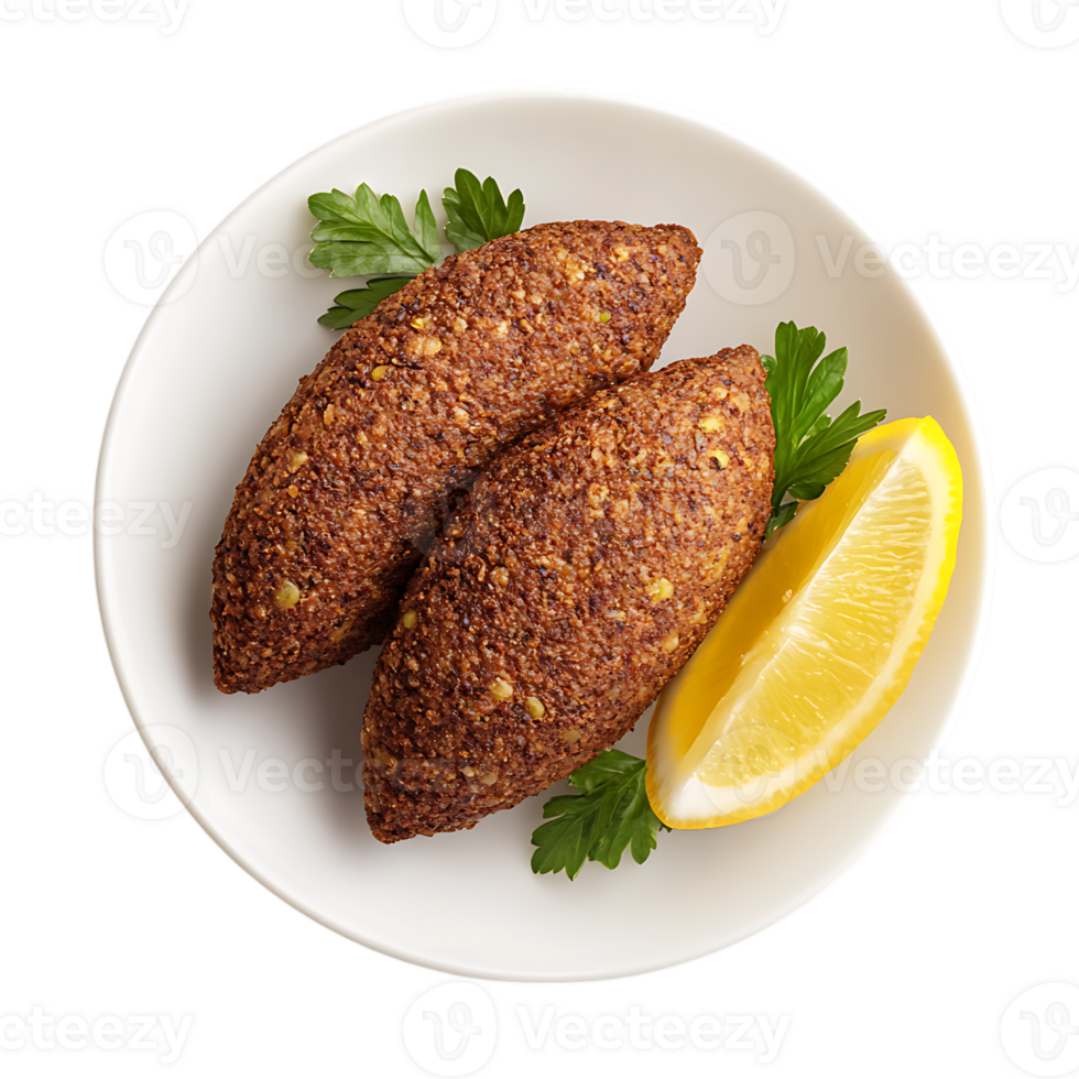 Two fried food items on a white plate with a lemon wedge png