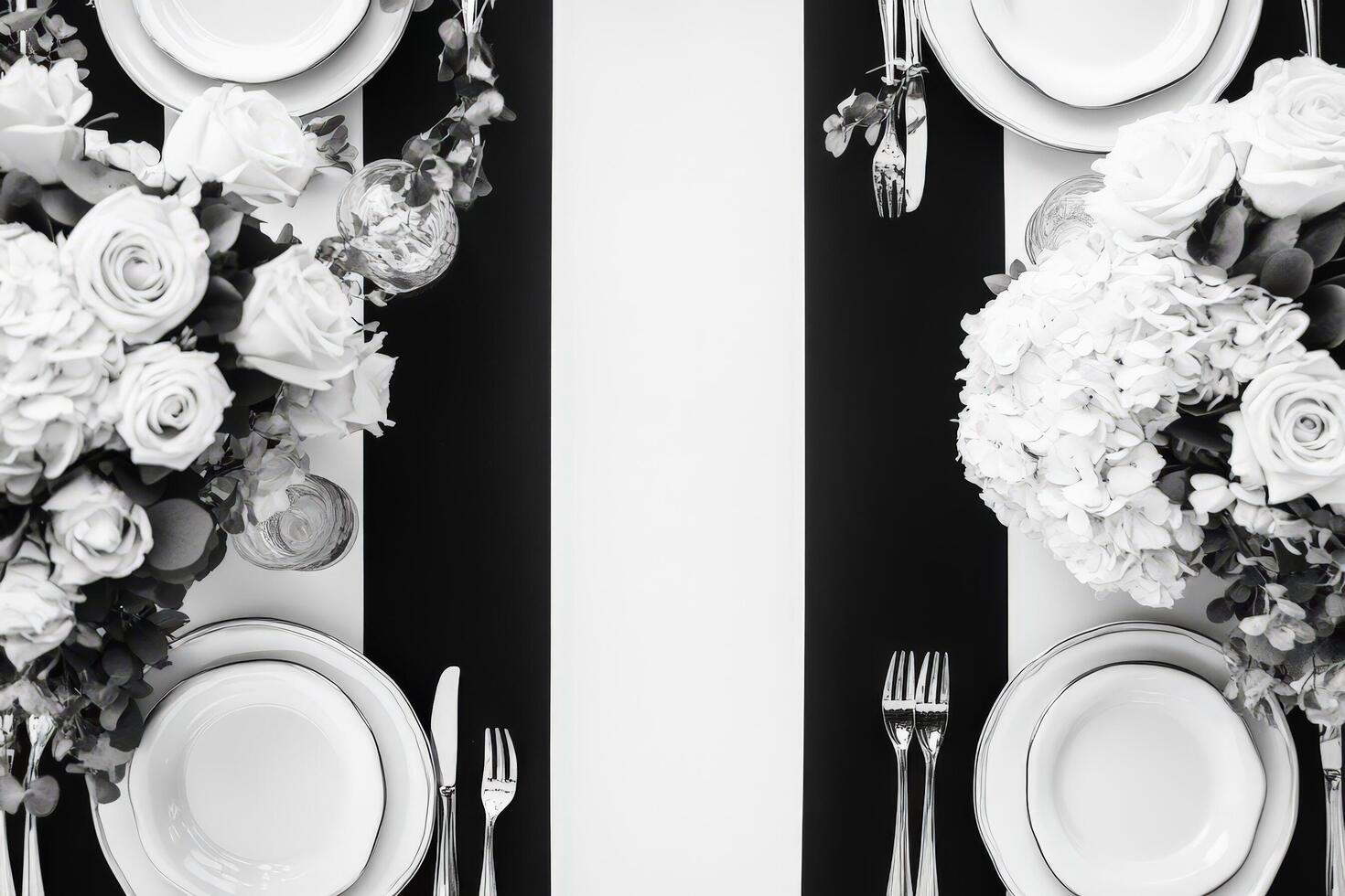 Elegant Black and White Table Setting with Flowers photo