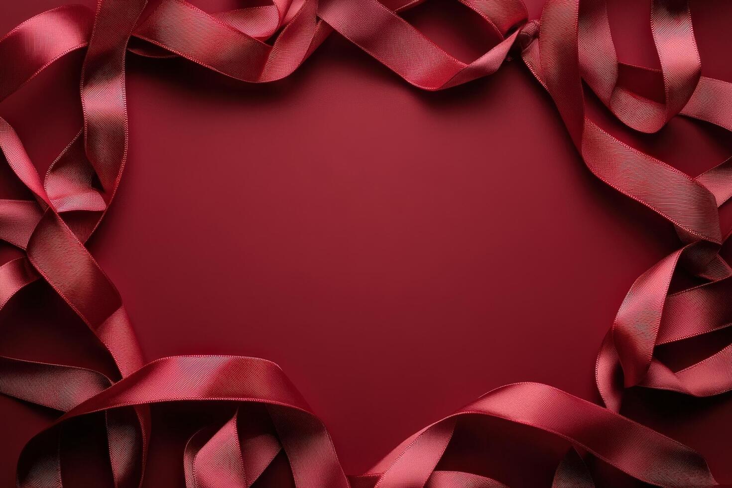 Crimson Ribbons Forming a Frame on Red Background photo