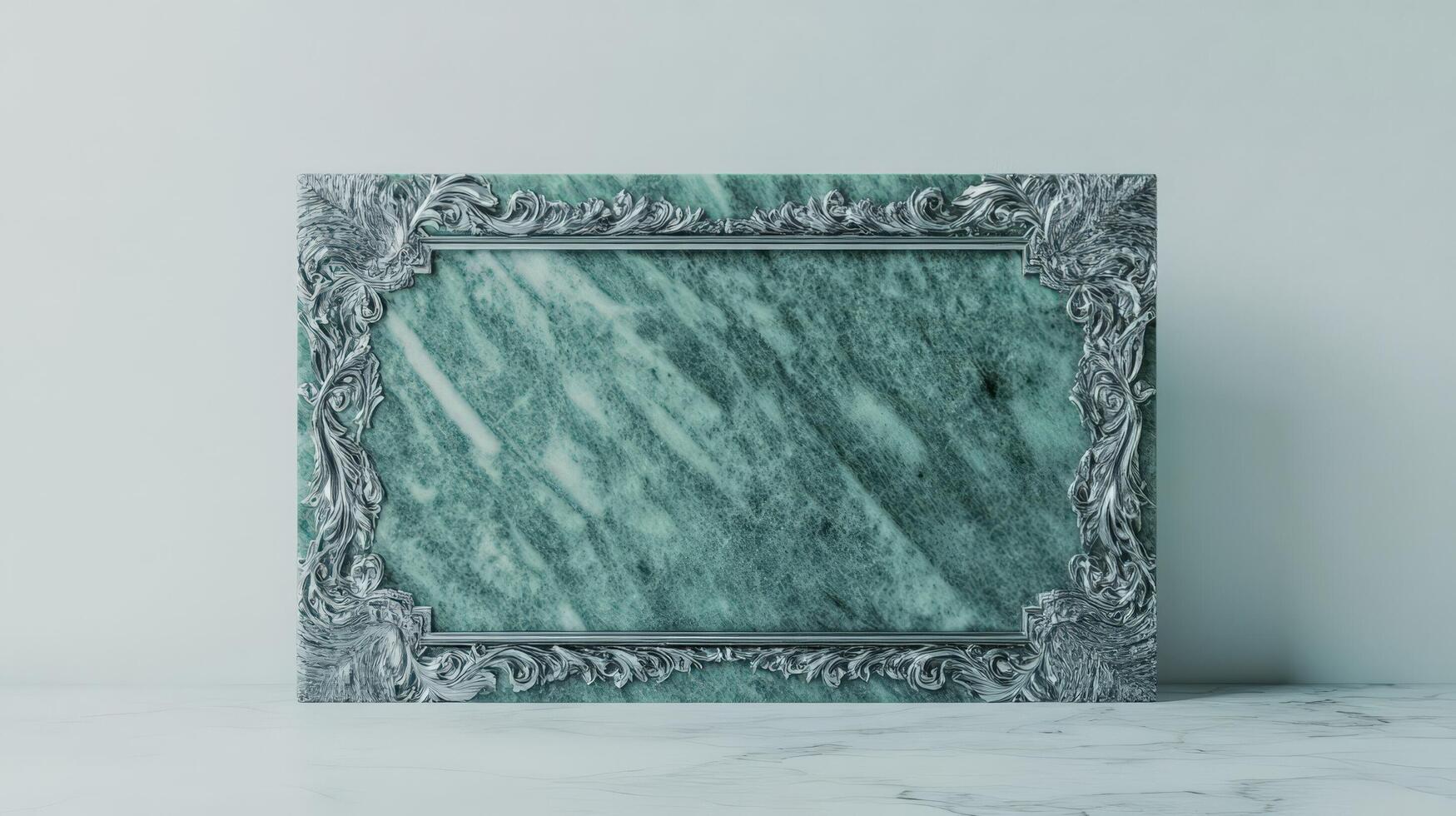 A green marble frame with ornate design photo
