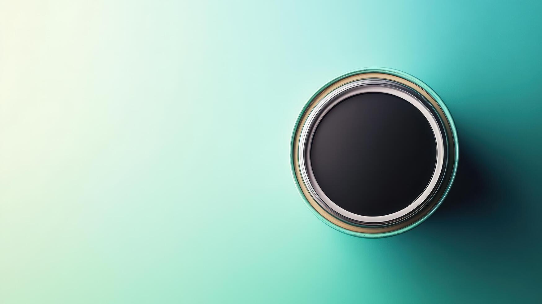 A black circular object on a green background photo