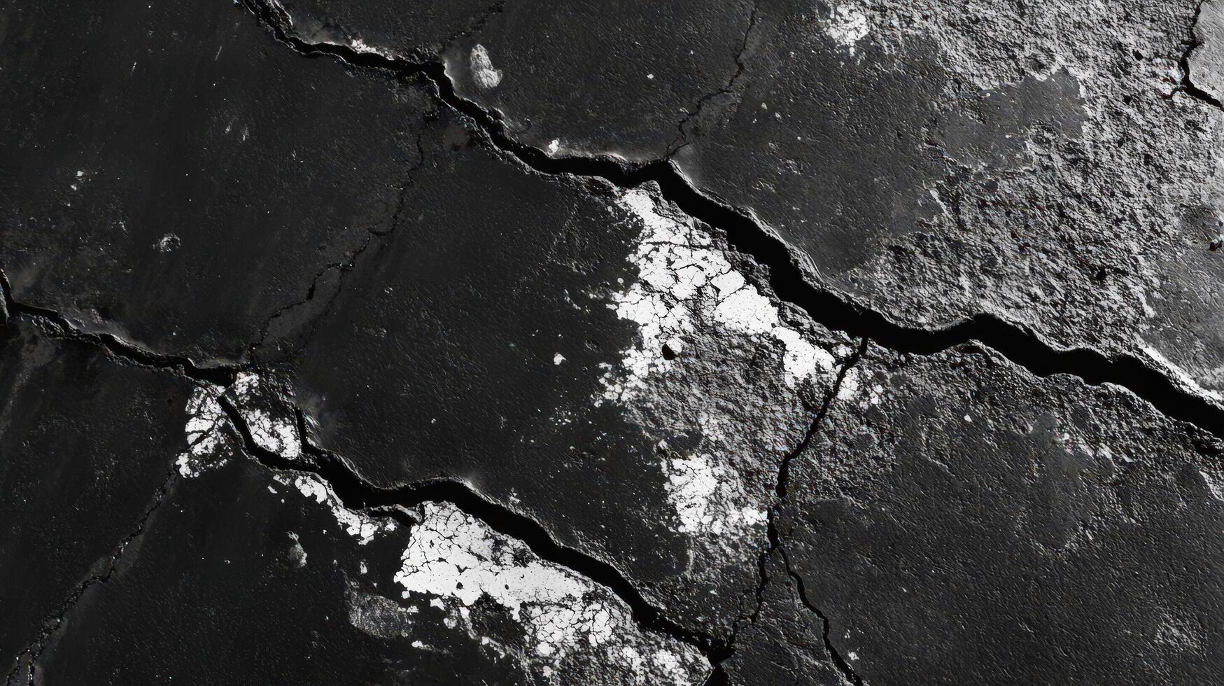 A close up of a crack in the ground photo
