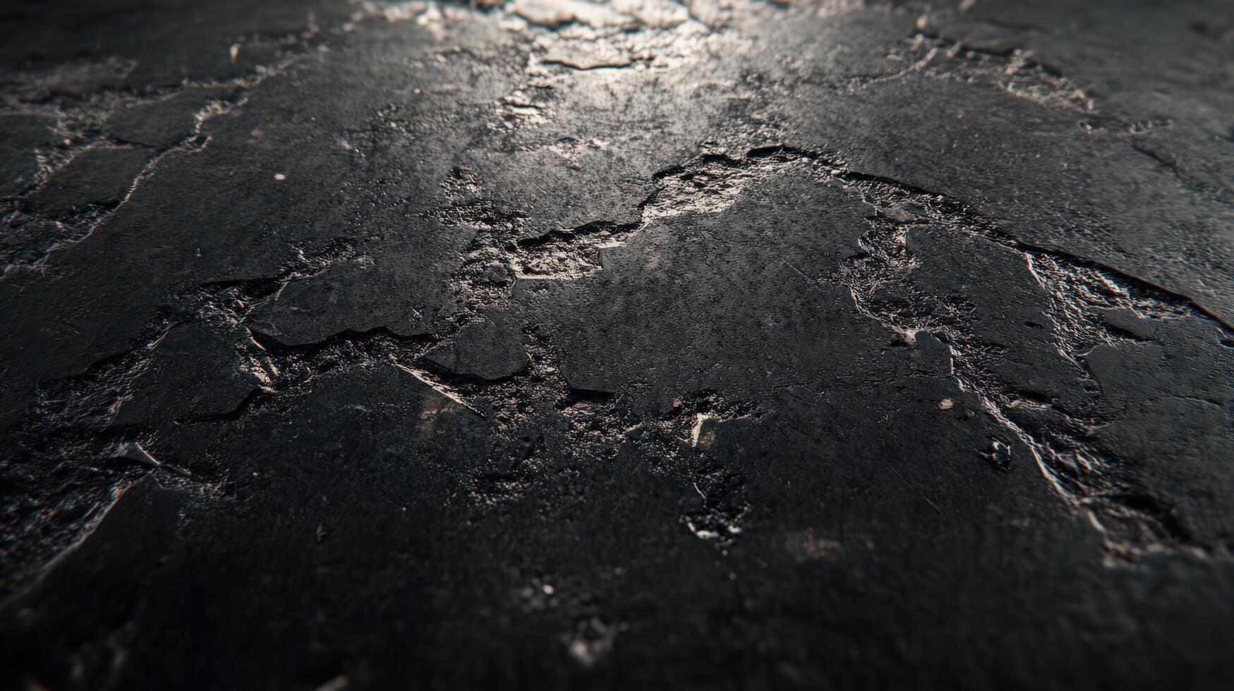 A close up of a black surface with some scratches photo