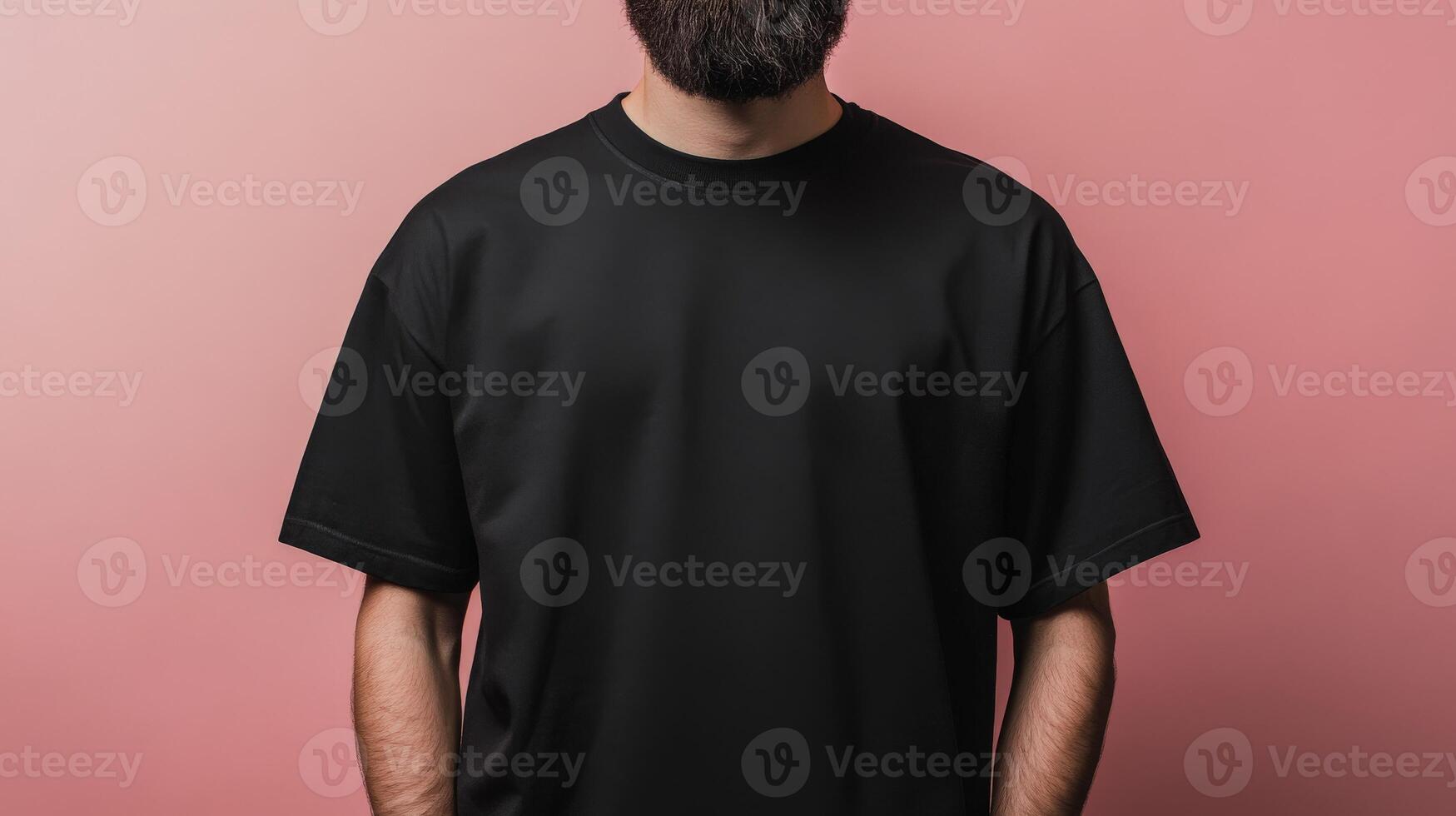 Man wearing a black t-shirt with a minimalist background photo