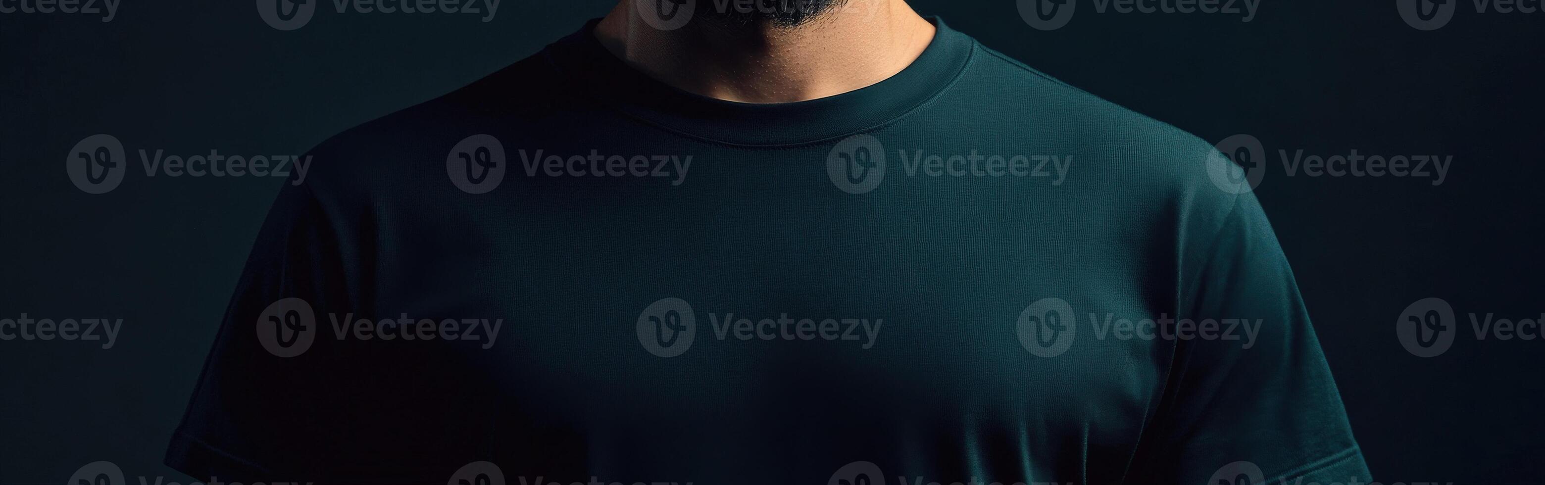 Dark background highlights a man wearing a black shirt photo