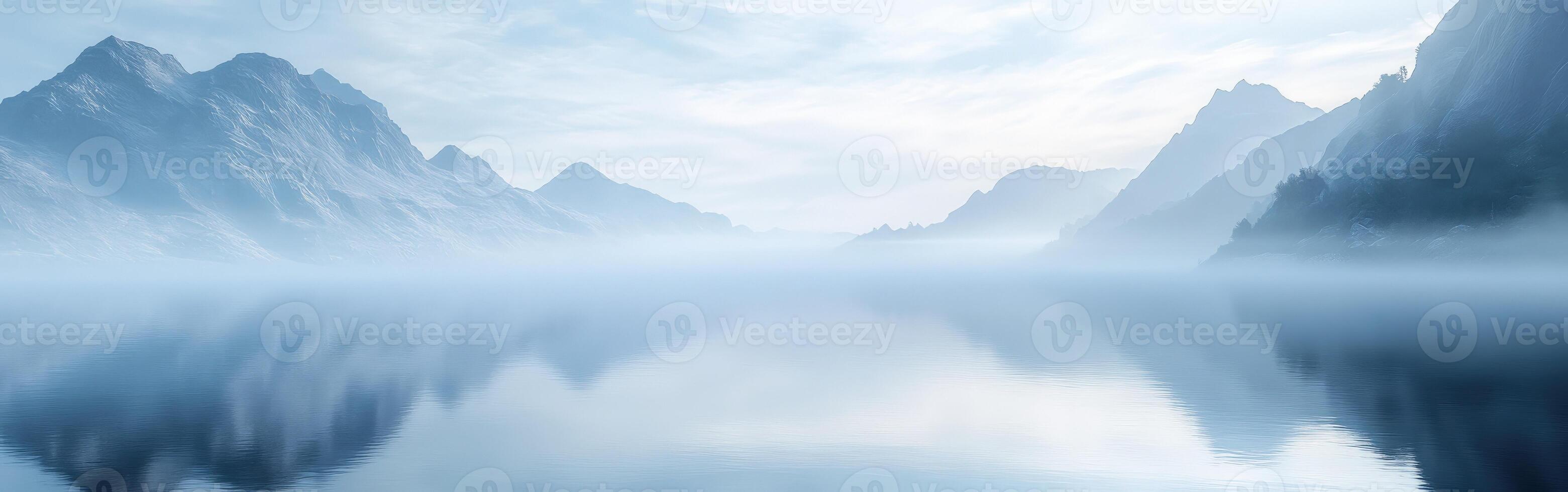 Mystical fog envelops serene mountains and calm waters at dawn photo