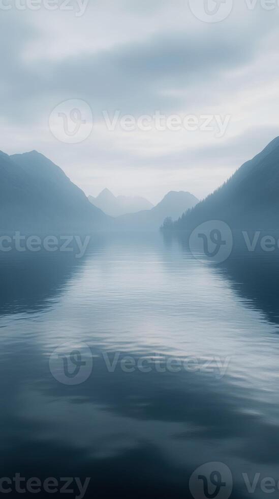 A lake with mountains in the distance photo