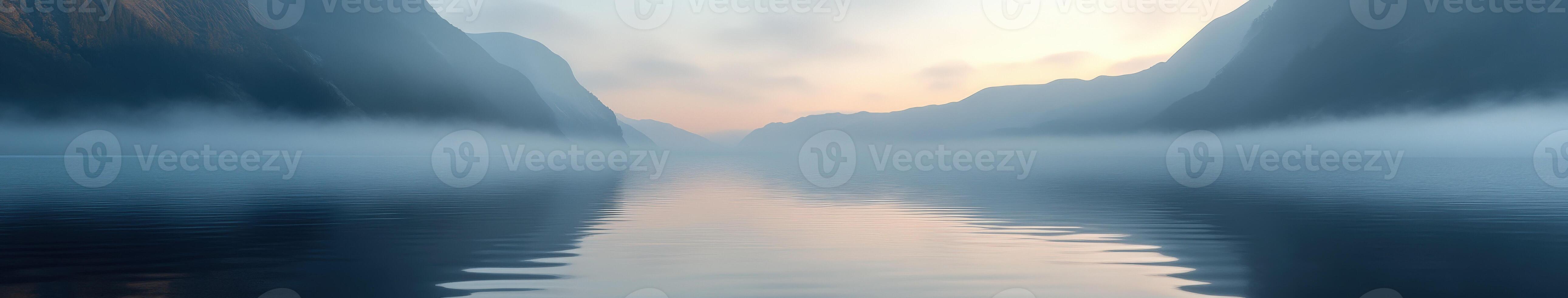A river with fog and mountains in the background photo