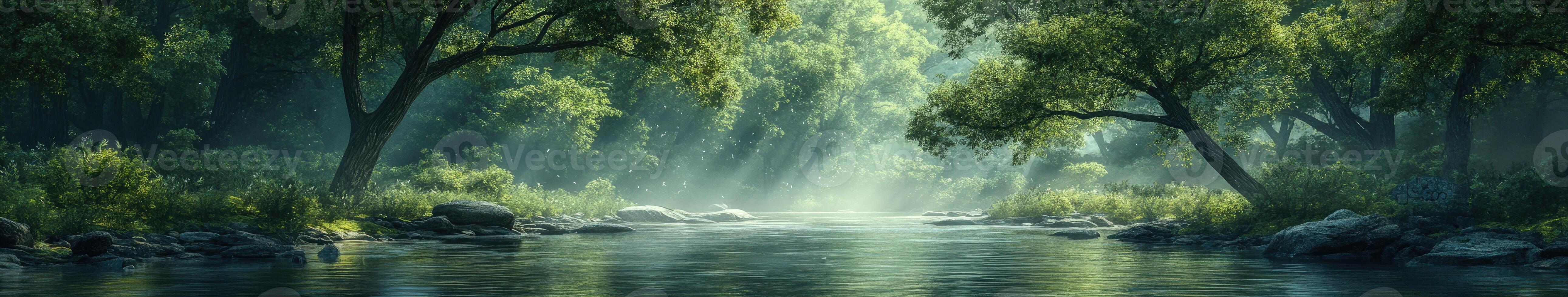 Fog gently envelops a serene river in lush green forest photo