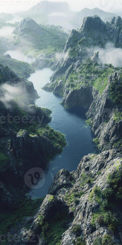 Misty river winding through rocky mountains in a serene landscape photo