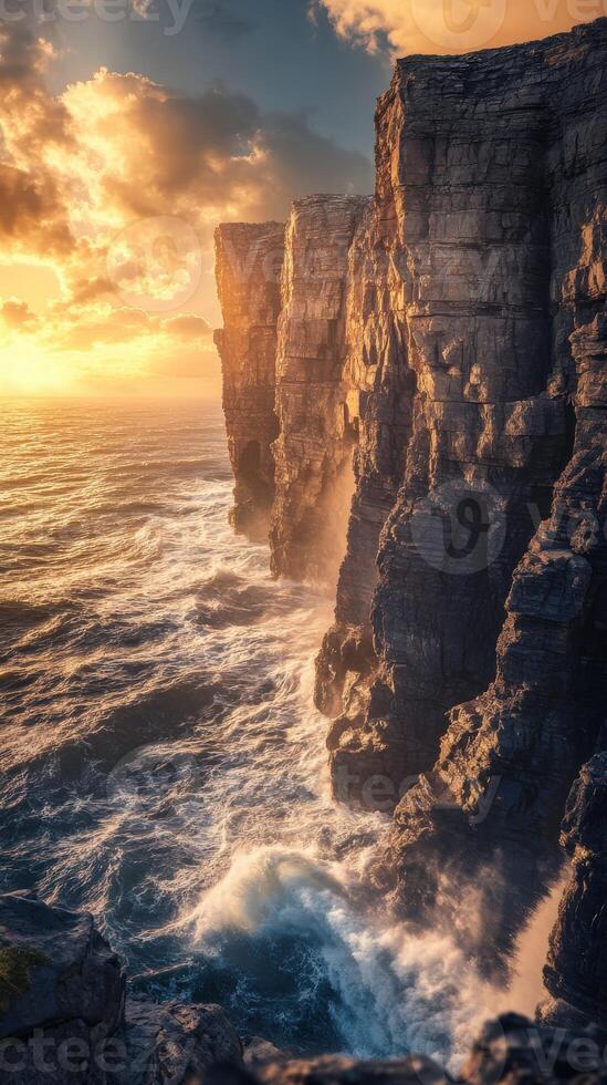 The sun sets over the cliffs of ireland photo