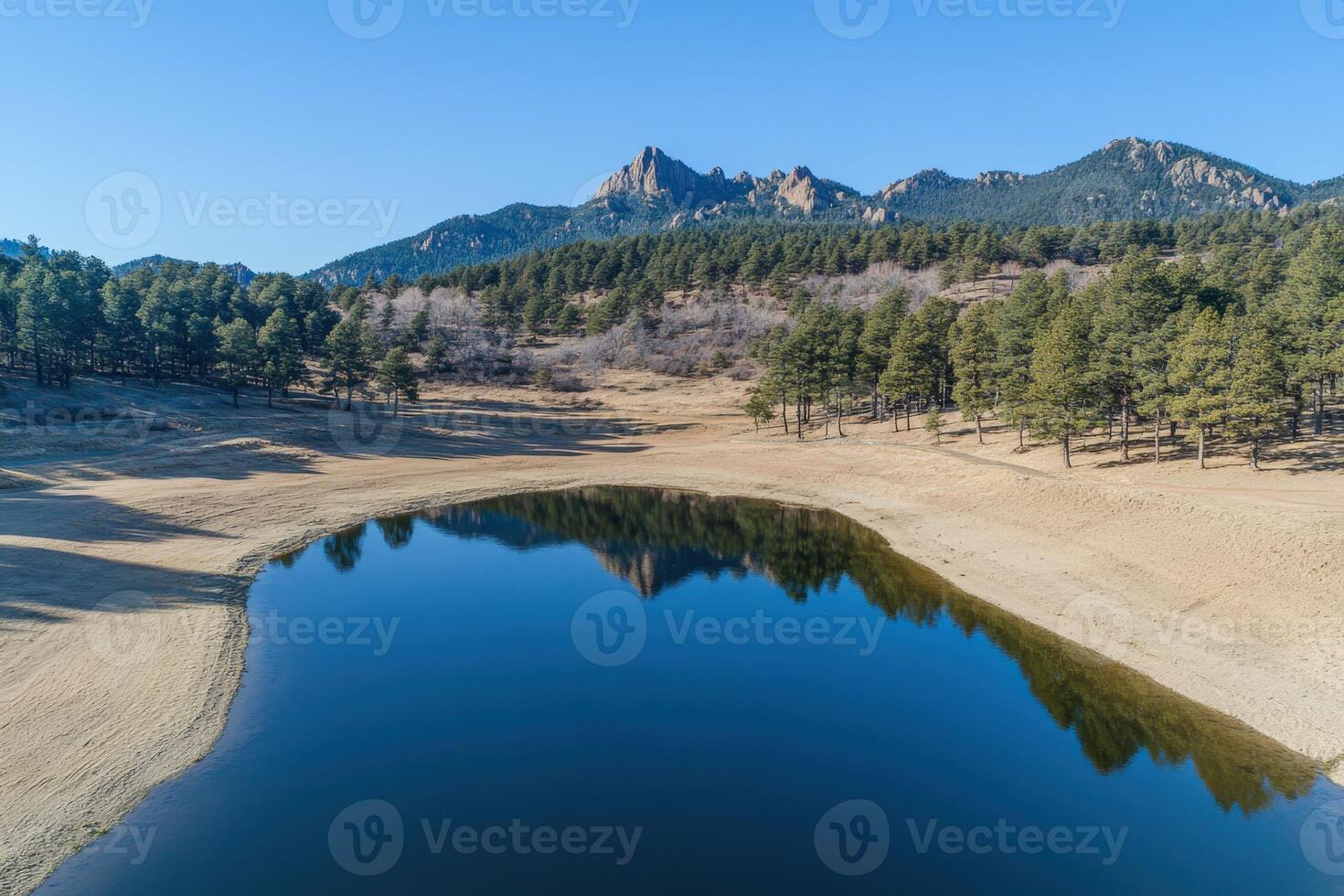 Reflection of mountains in lake photo