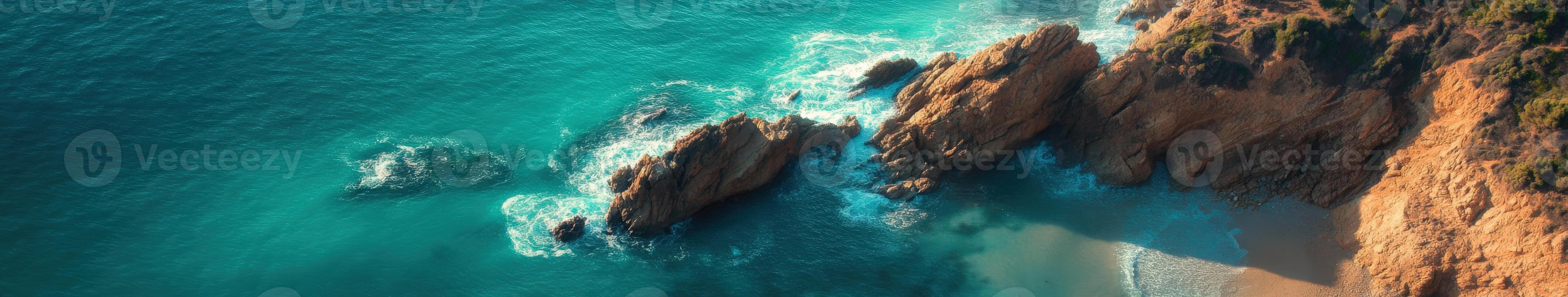 An aerial view of the ocean and beach photo