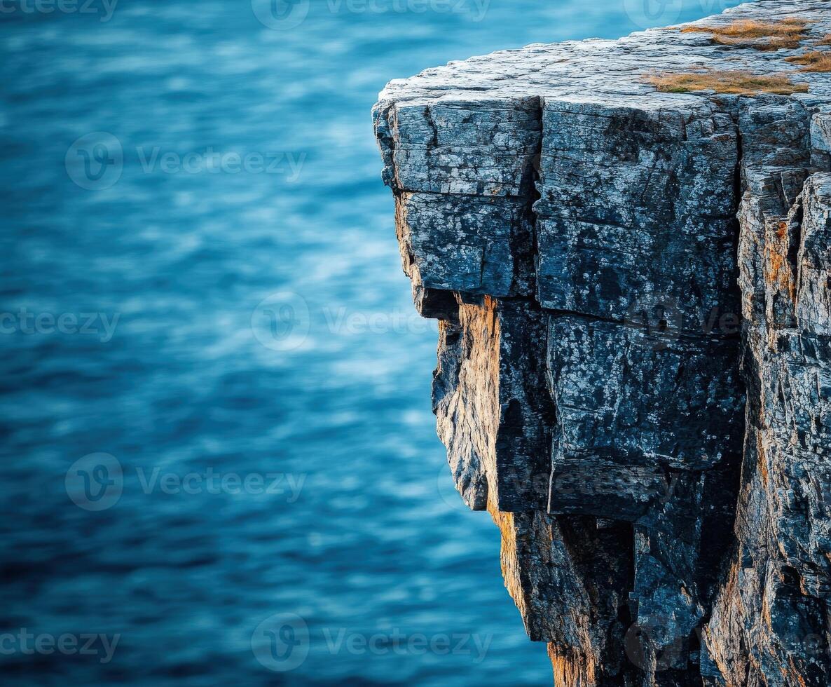 Stunning cliff edge overlooking ocean photo