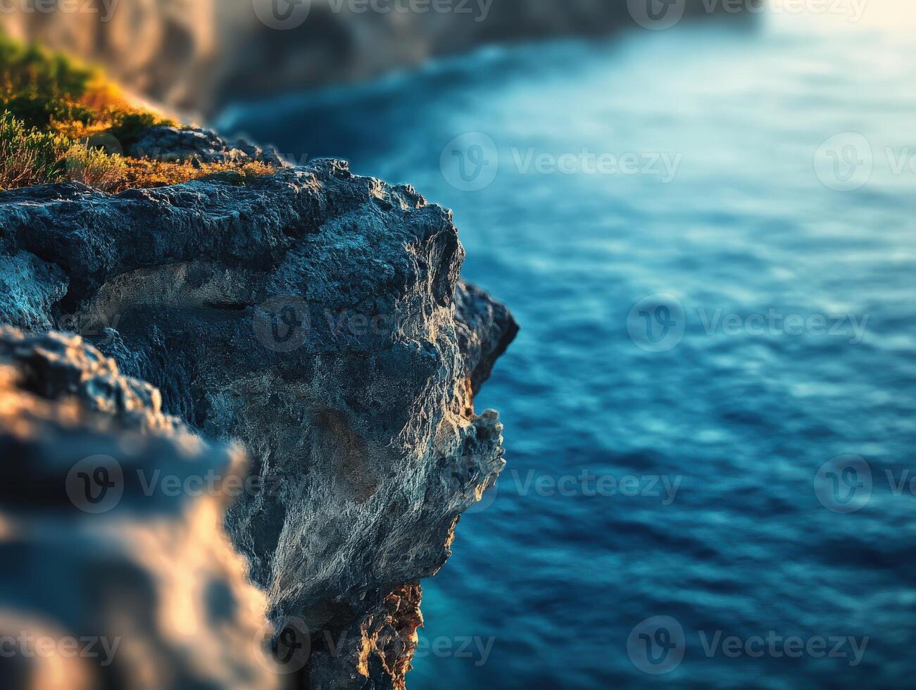 Ocean view from rocky cliff photo