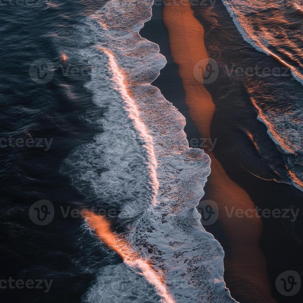 An aerial view of the ocean and waves photo