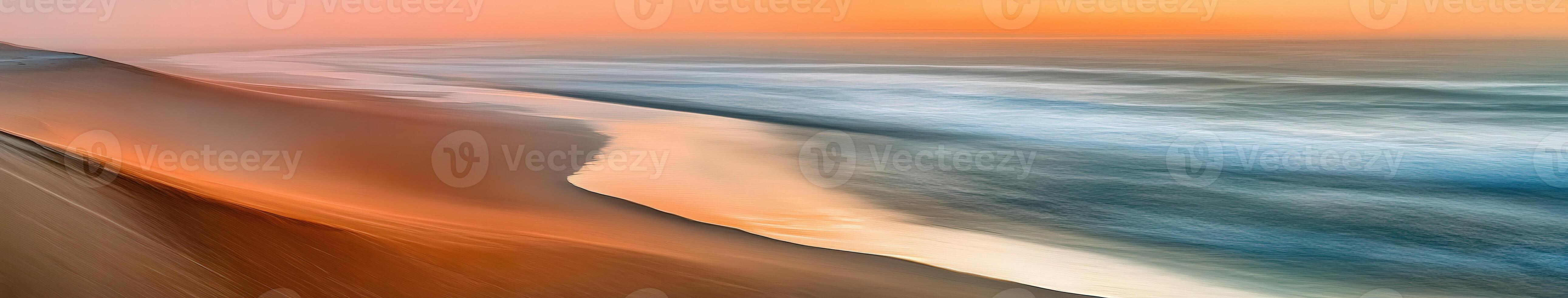 Serene sunset over sandy beach photo