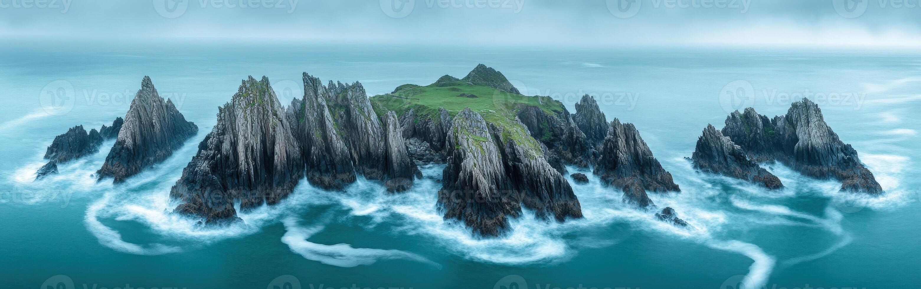 Rocky coast with rugged island photo