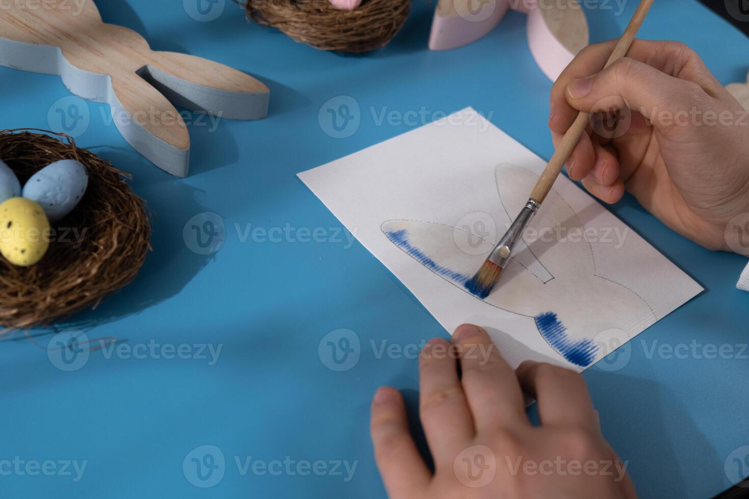 EASTER bunny painting Sustainable preparation Diy process of making handmade greeting cards. Step by step activity for children. Inclusive and responsible stress relief holiday hobby. Conscious celebration photo