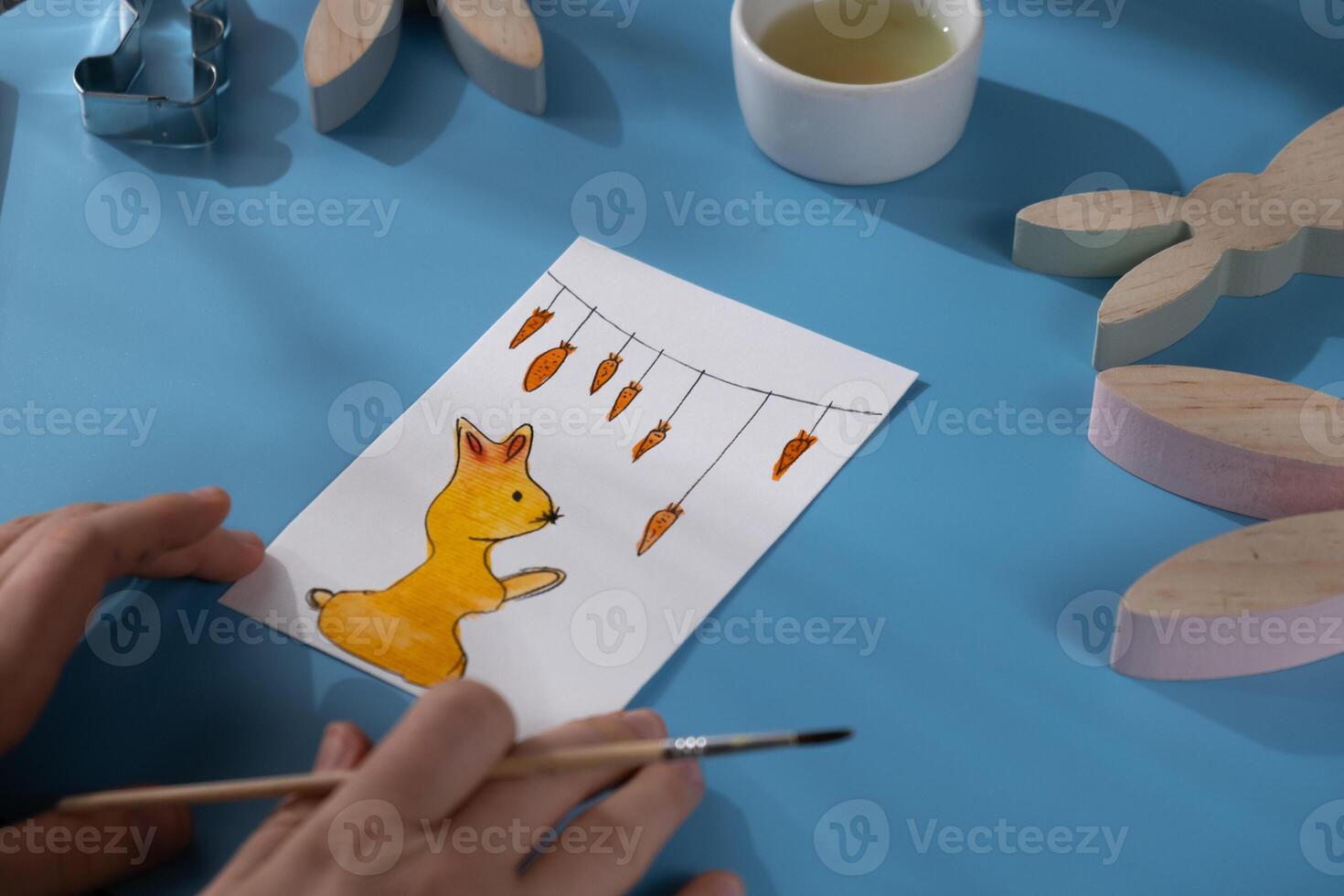 Drawing Easter rabbit bunny Storytelling of creating craft Easter greeting card holiday present. Tactile hand-on activity. Master class progress of creative me-made gifts. Seasonal domestic life micro moment hobby. Sustainable living photo