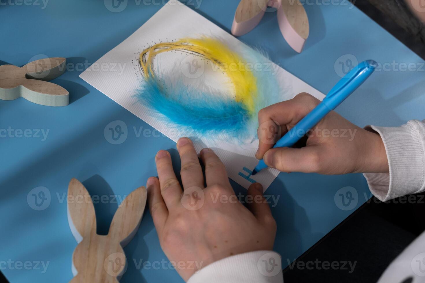 EASTER egg made of rope and feathers Sustainable preparation Diy process of making handmade greeting cards. Step by step activity for children. Inclusive and responsible stress relief holiday hobby. Conscious celebration photo