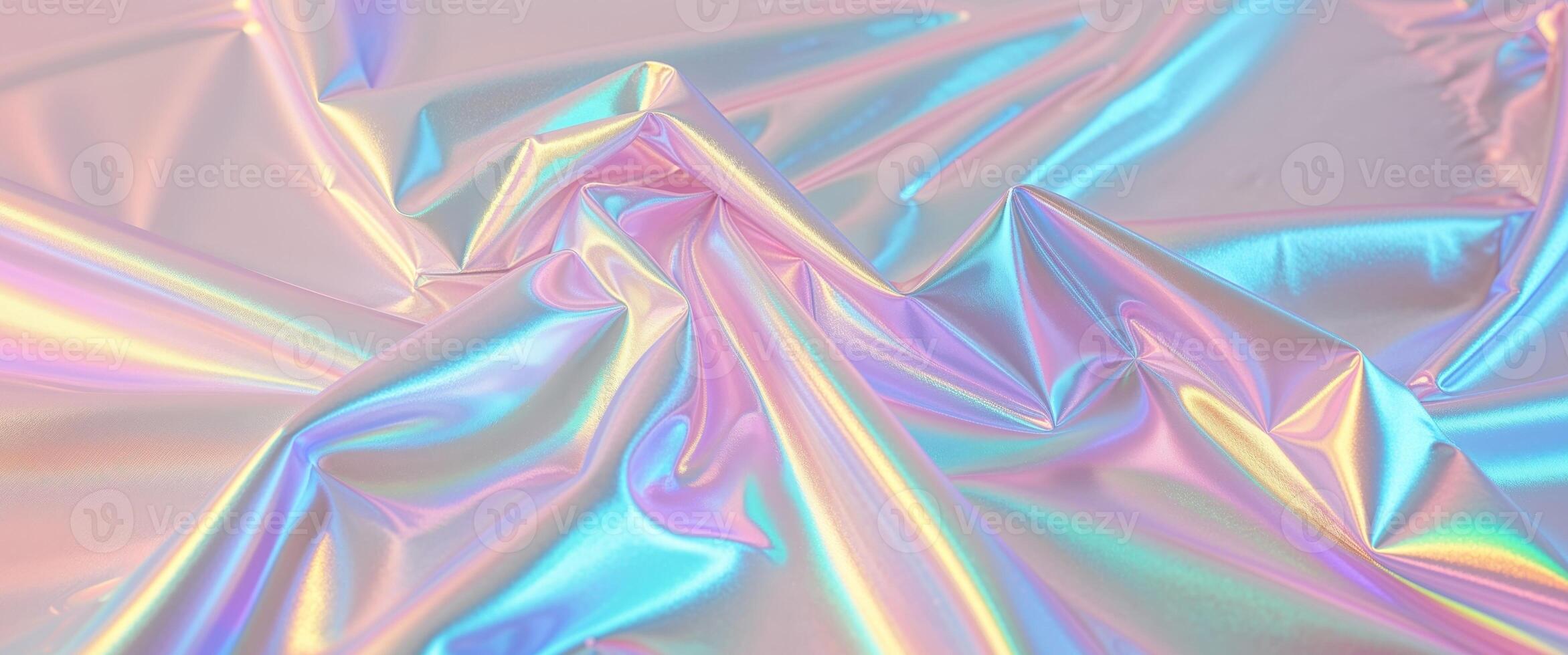 A shiny holographic fabric with a rainbow pattern photo