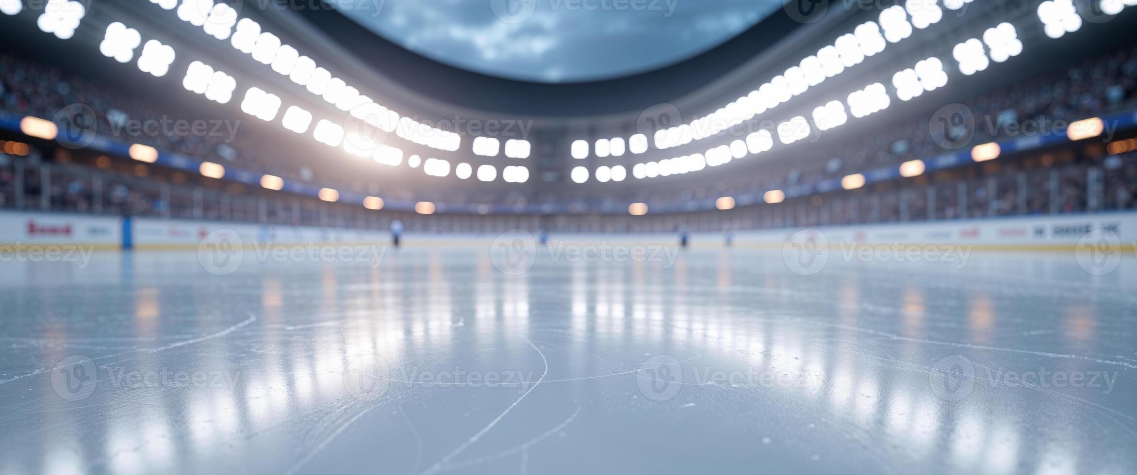 An empty hockey rink with lights on it photo